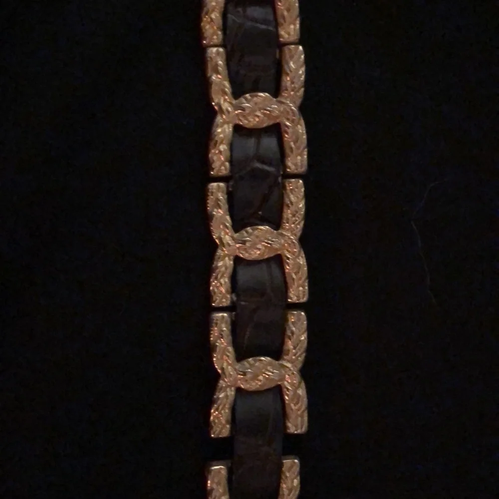 Gold and brown belt 35 inches to first hole. Size M